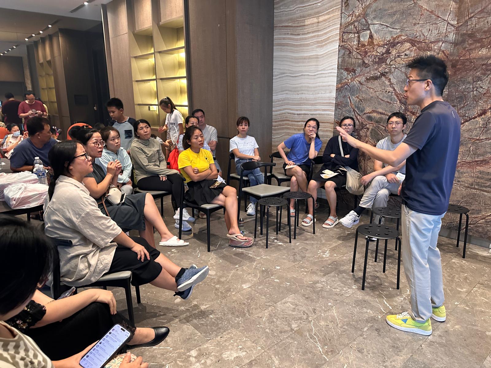 Teachers and parents at a sharing session for Oxkids